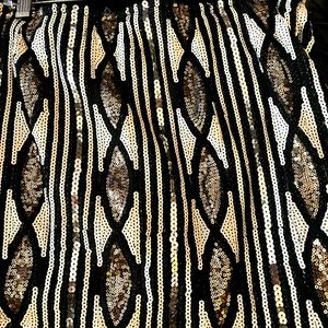 Sequined mini shirt. Stretch waist. Like new.